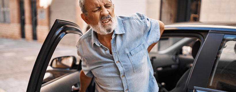Patient suffering from Back Pain in need of auto accident injury care in Bear